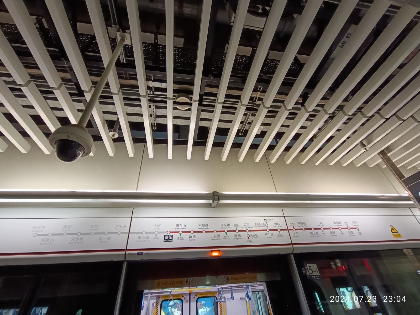 Surveillance camera monitoring a platform at night — representative of perimeter security and patrol drone programs